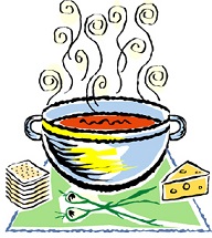 bowl of soup with cheese, crackers